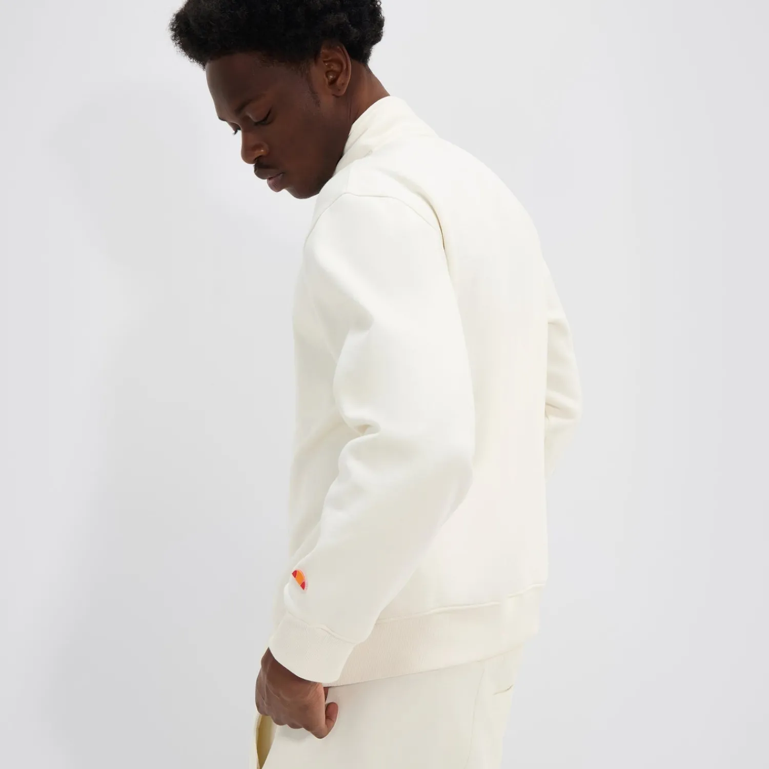 Ellesse Trainingsanzüge>Oberteil Baleor mit 1/4-Reißverschluss für Herren Cremeweiß