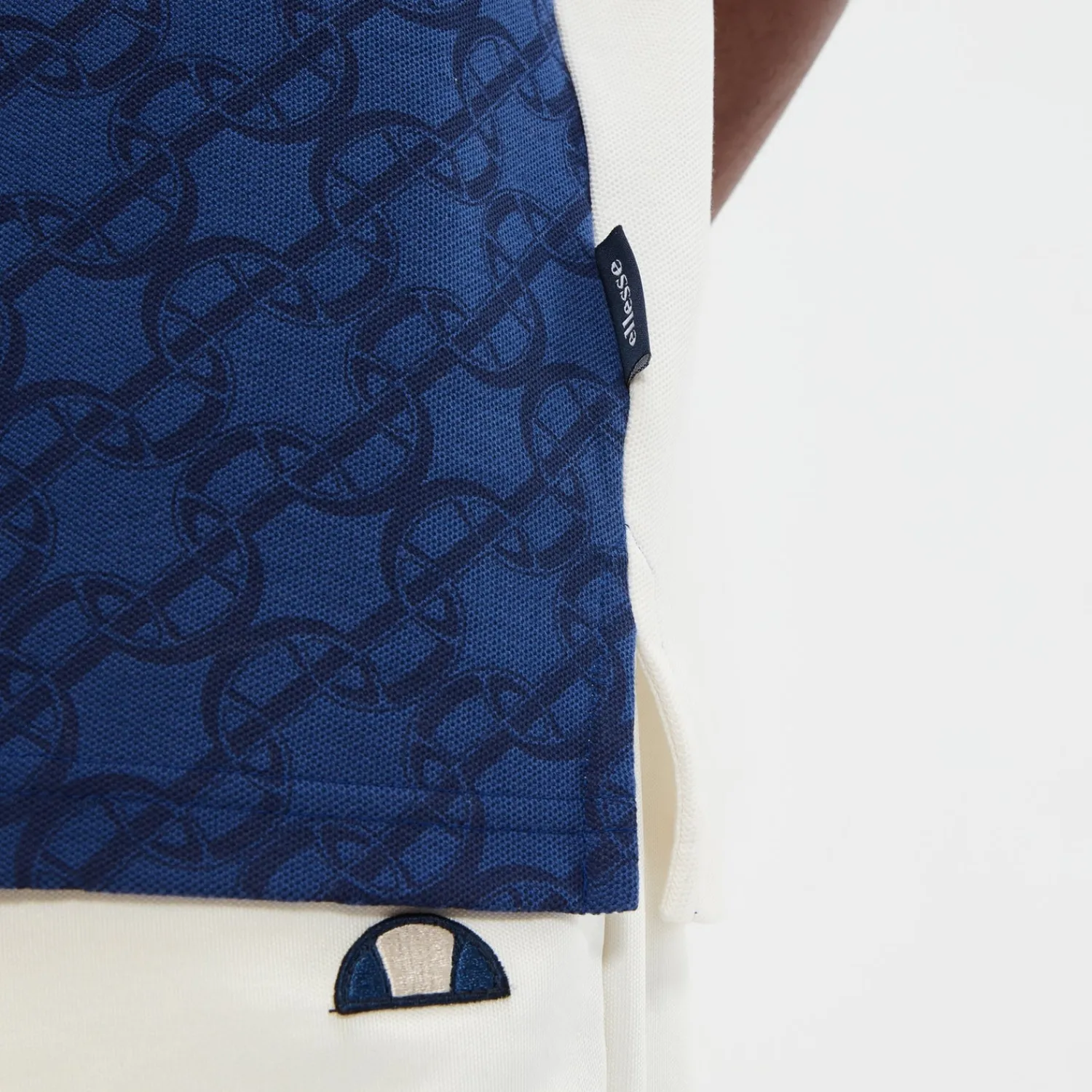 Ellesse Poloshirts>Poloshirt Suanio Cremeweiß/Marineblau für Herren