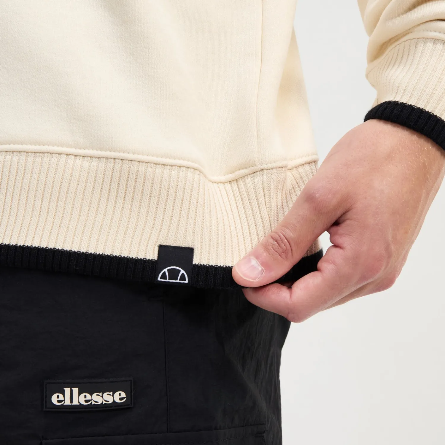 Ellesse Hoodies & Sweatshirts>Sweatshirt Sheridan für Herren mit 1/4-Reißverschluss Weiß